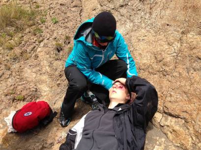 Me attending to my patient on the beach.